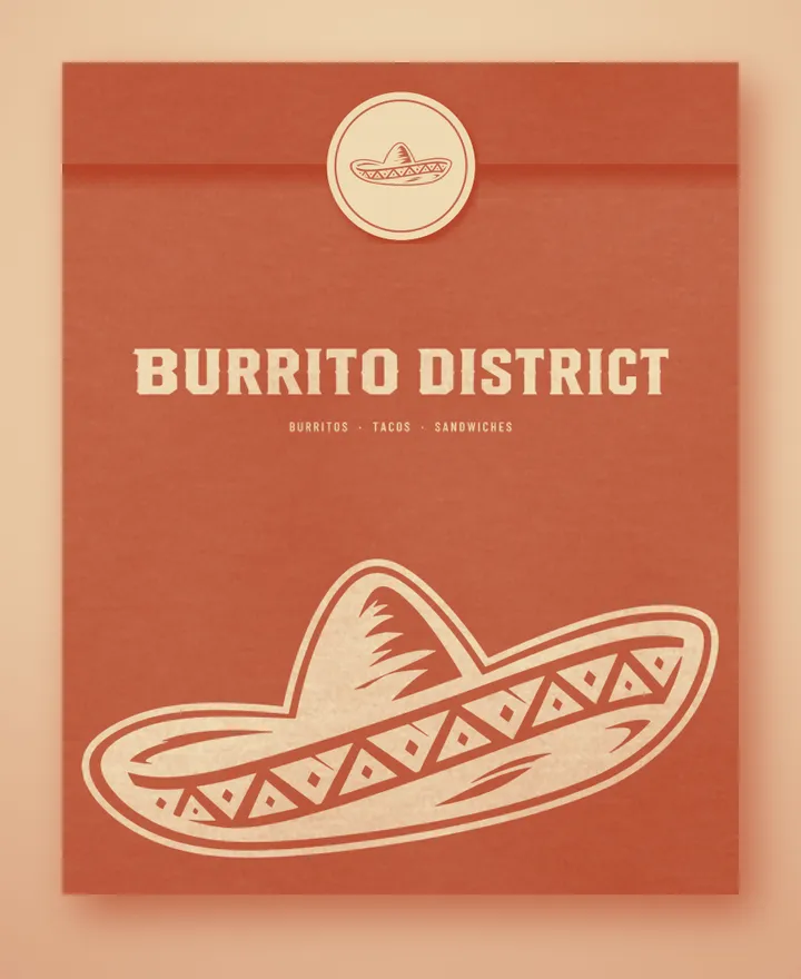 The Burrito District paper bag, folded closed with the round hat seal.